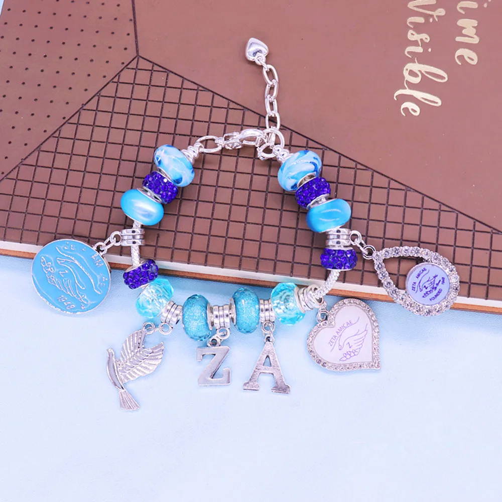 Браслет с удлинителем ZETA Amicae голубые бусины основанные на заказ греческие буквы