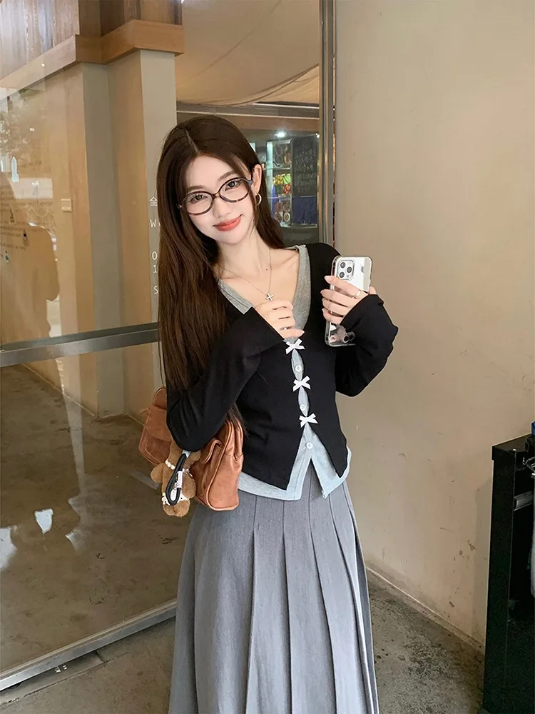 Искусственная двухсекционная короткая трикотажная рубашка с бантом женская