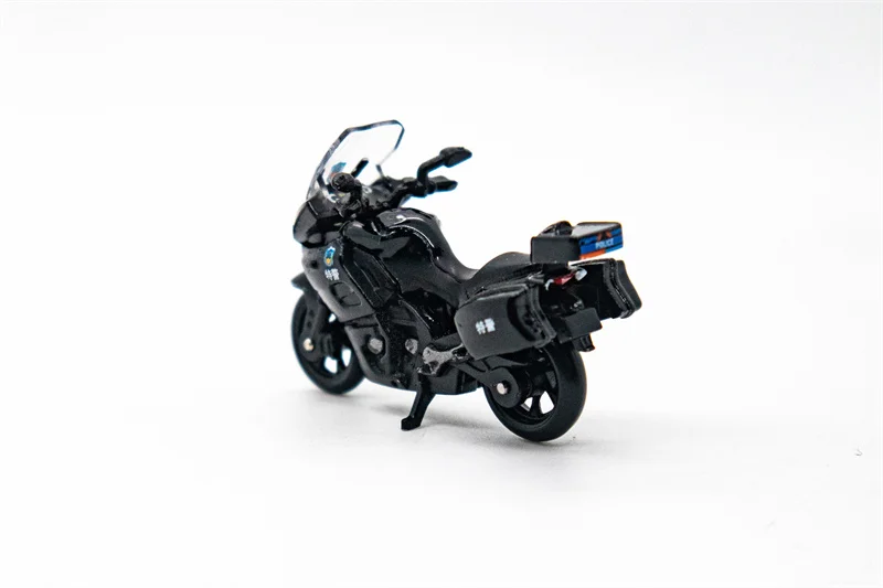 Модель автомобиля китайской полиции XJ 1:64