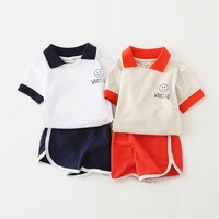 childrens short sleeved suit 2022 new korean boy casual two piece suit baby lapel fashion childrens clothing wholesale