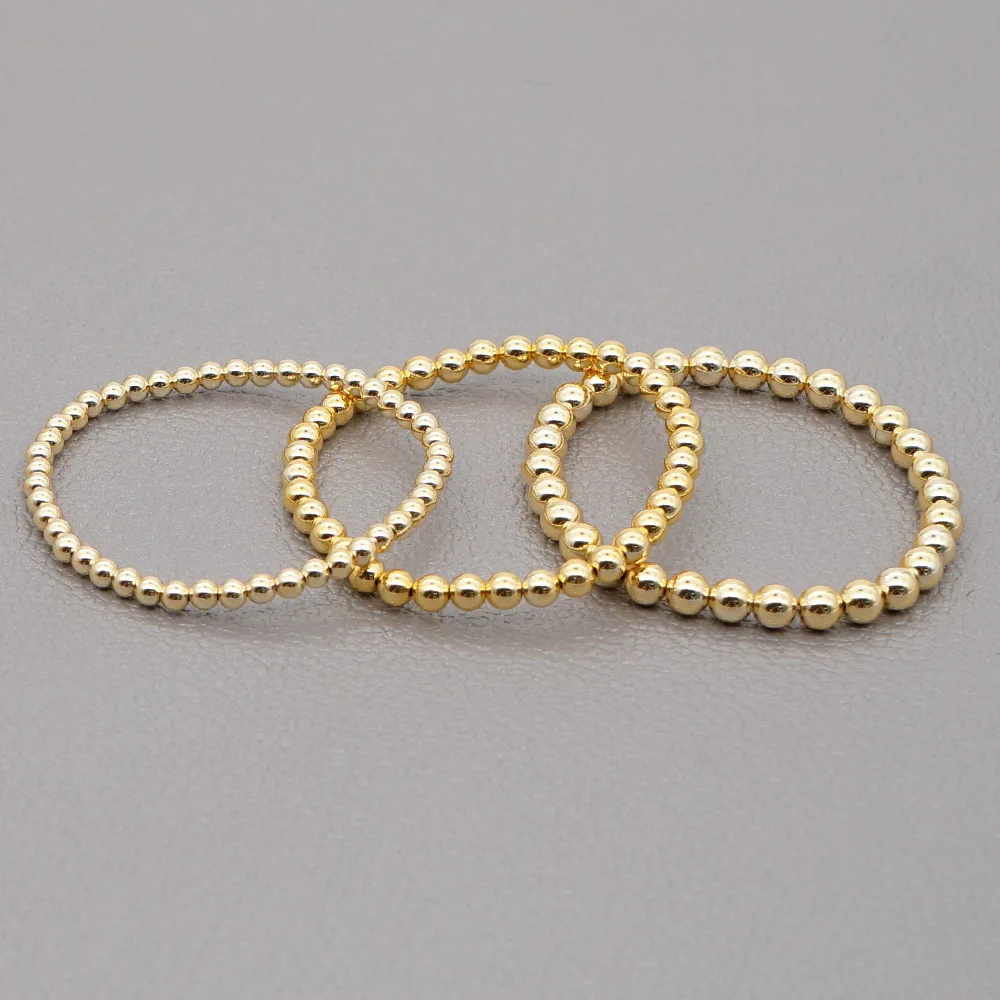 Женский браслет из акрила с позолоченными золотыми шариками в богемном стиле