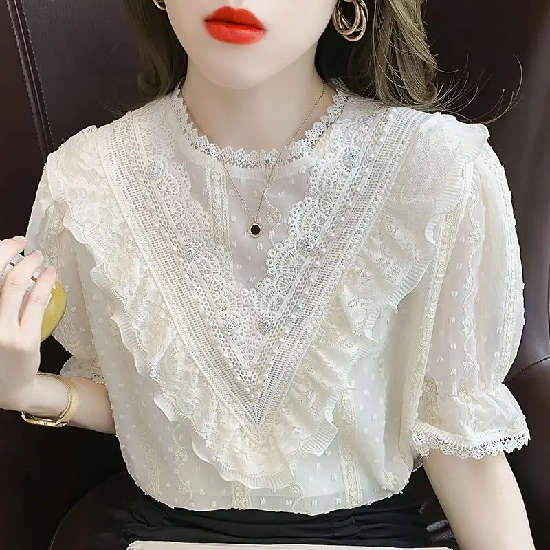 

Fairy blouse 2022 new fashion lace short -sleeved shirt network yarn and leaf border nails round collar sweet solid o neck shirt