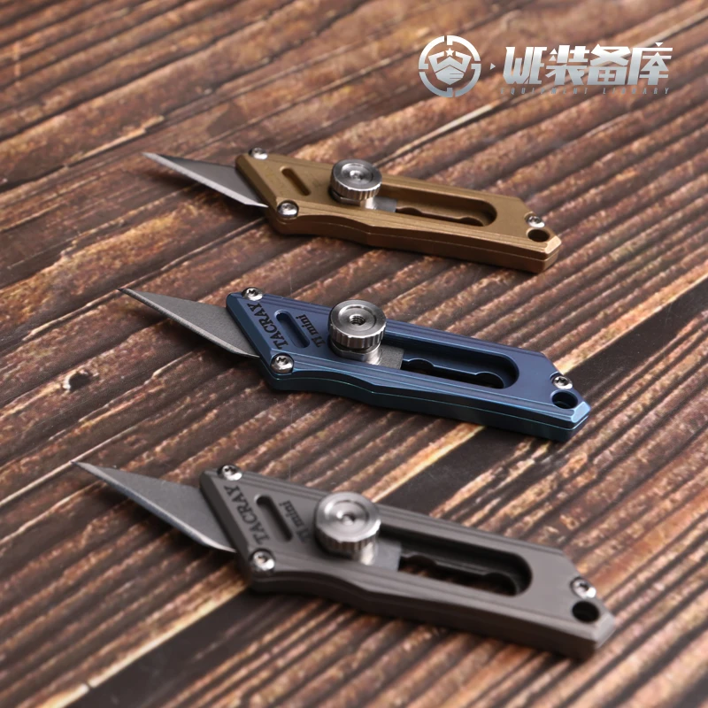 

[WE equipment library] edc utility knife titanium alloy tool knife outdoor household portable express brass wallpaper knife