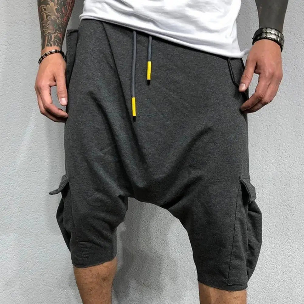 

Casual Sport Pants Hydrophilic Mid Waistline Large Pockets Loose Drawstring Capri Pants Harem Pants Solid Color