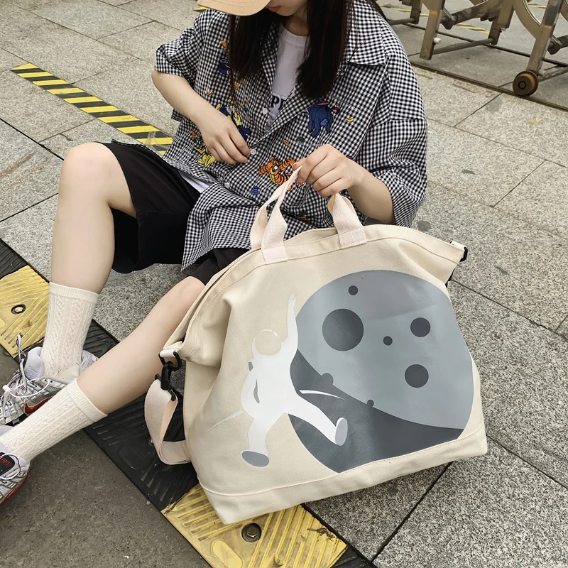 

Travel bag female short-distance portable travel canvas cartoon bag short-term business trip large capacity luggage bag