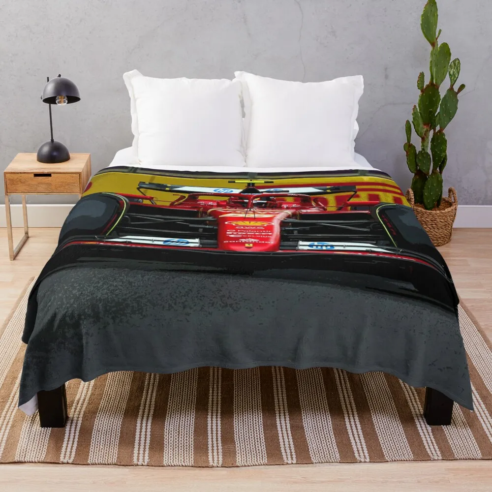 Карлос Саинц гоночный его автомобиль F1 2024 года на улицах Баку во