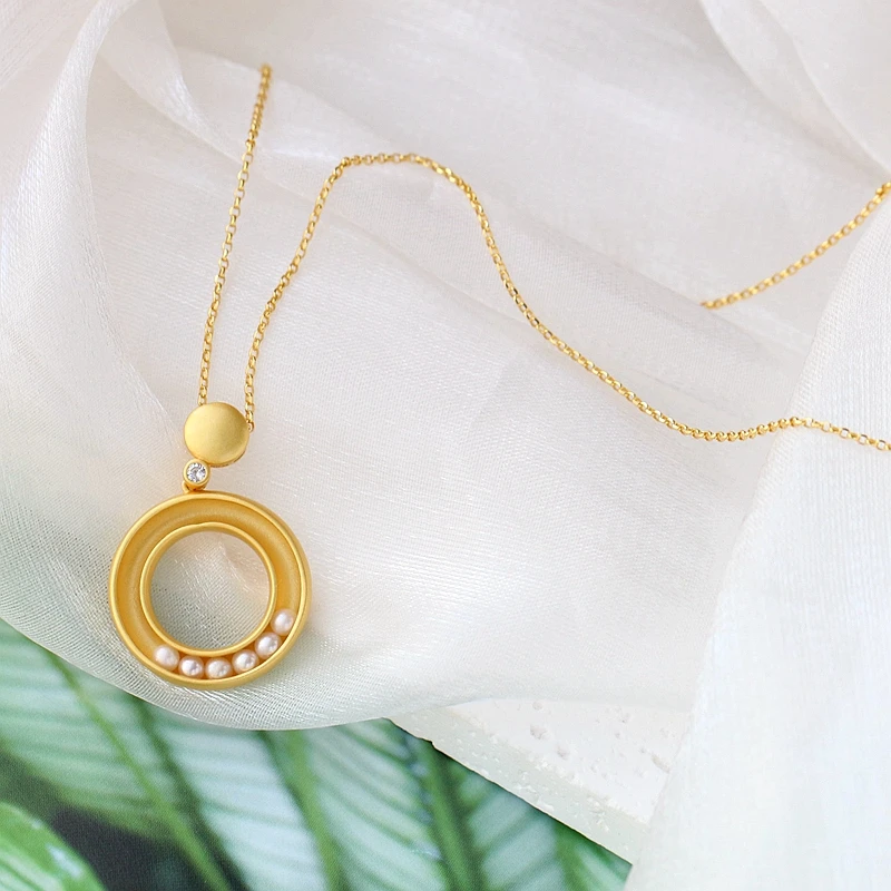 Кулон кольцевой из серебра 925 пробы с натуральным жемчугом