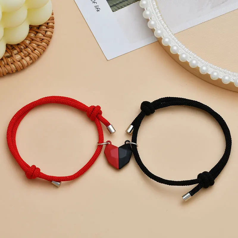 

New black and white love wishing stone couple bracelet splicing magnetic adjustable hand rope men's and women's fashion jewelry