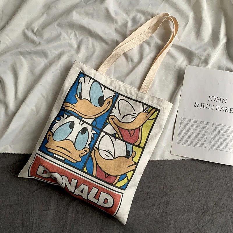 

2023 холщовые сумки-тоуты Disney для девочек, сумки аниме Дональд Дак, вместительная сумка для хранения, милые Мультяшные сумки через плечо, подарки