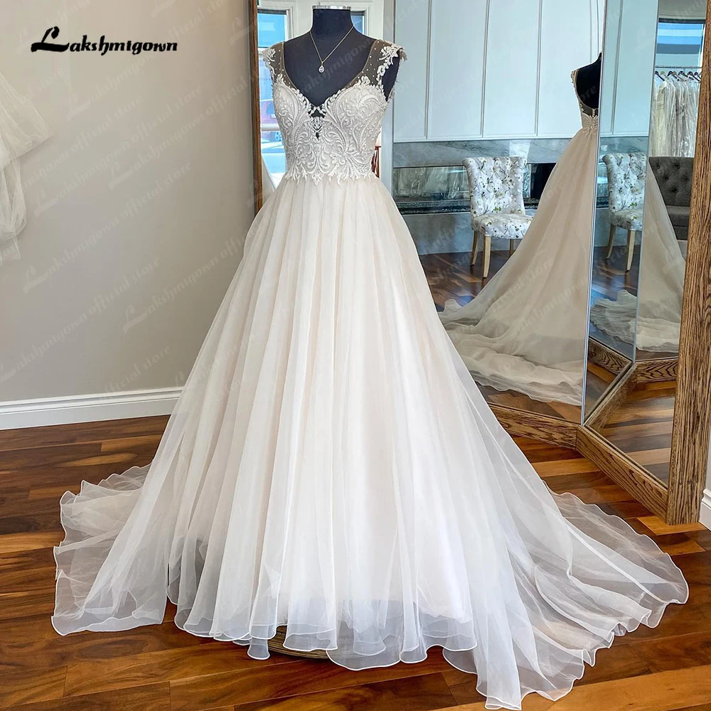 

Lakshmigown V-Neck Bead Cap Sleeve A line Wedding Dresses Appliques Organza Skirt Sexy Back Wedding Gowns for Bride