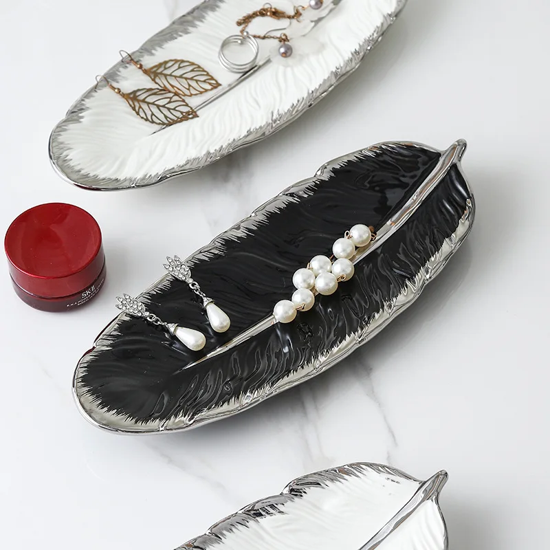

Silver-edged black and white feather tray, ceramic necklace, jewelry storage tray, luxury accessories,