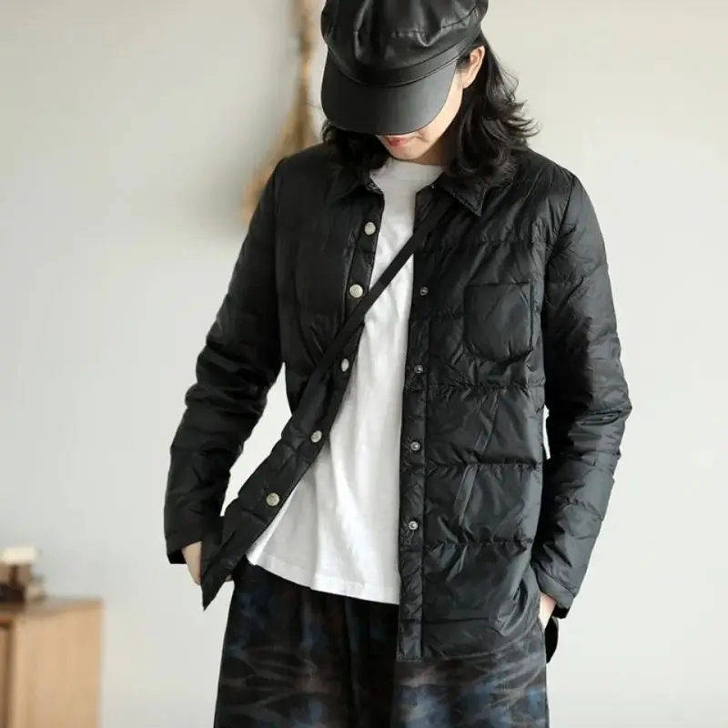 Осенне-зимняя женская куртка с перьями