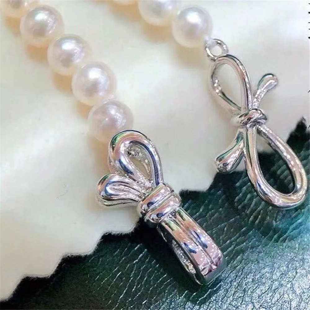 

S925 sterling silver single breasted natural pearl necklace sweater chain fashion version of the buckle