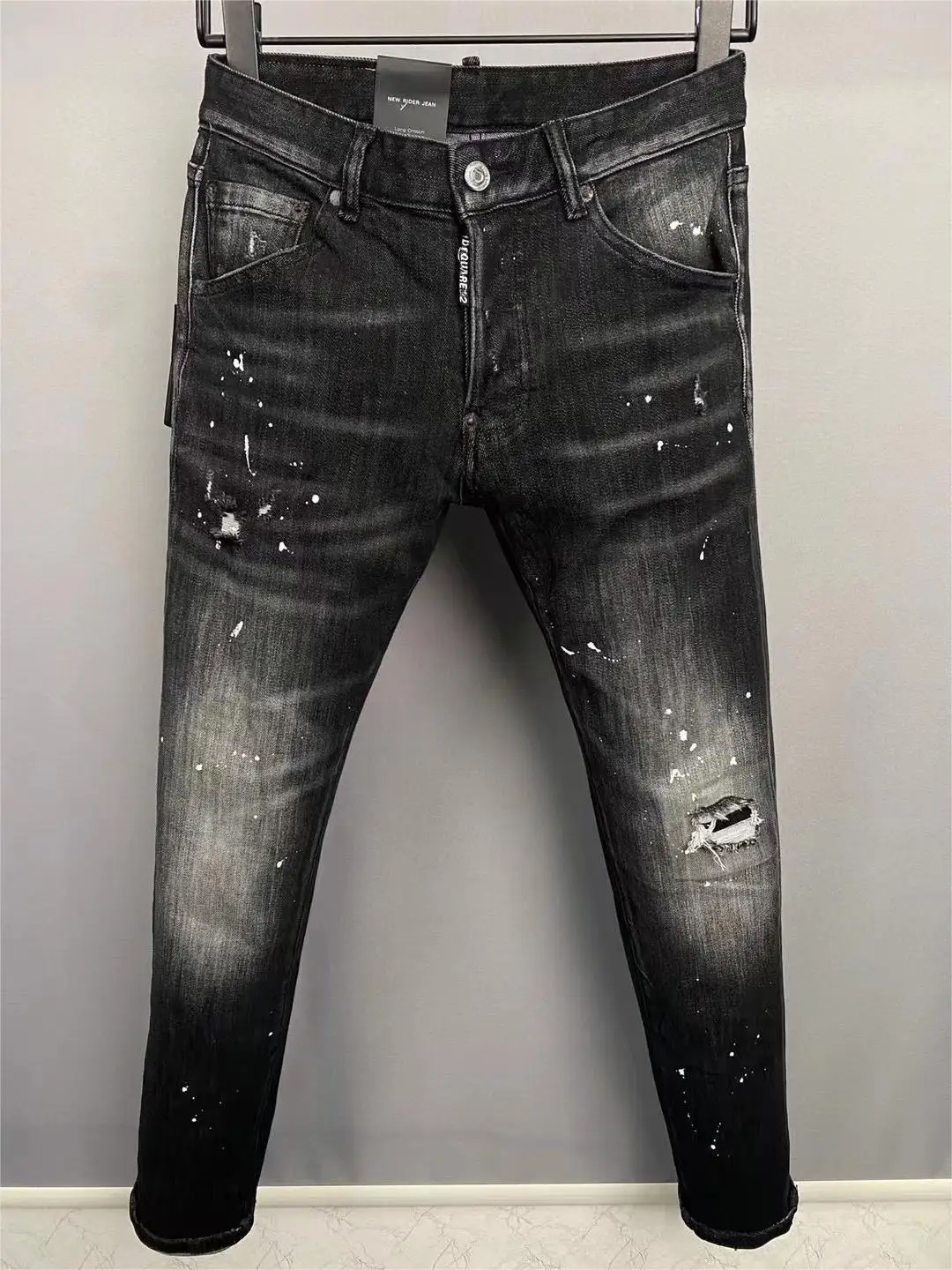 

2023 new fashion tide brand men's washing worn out torn paint locomotive jeans 9862