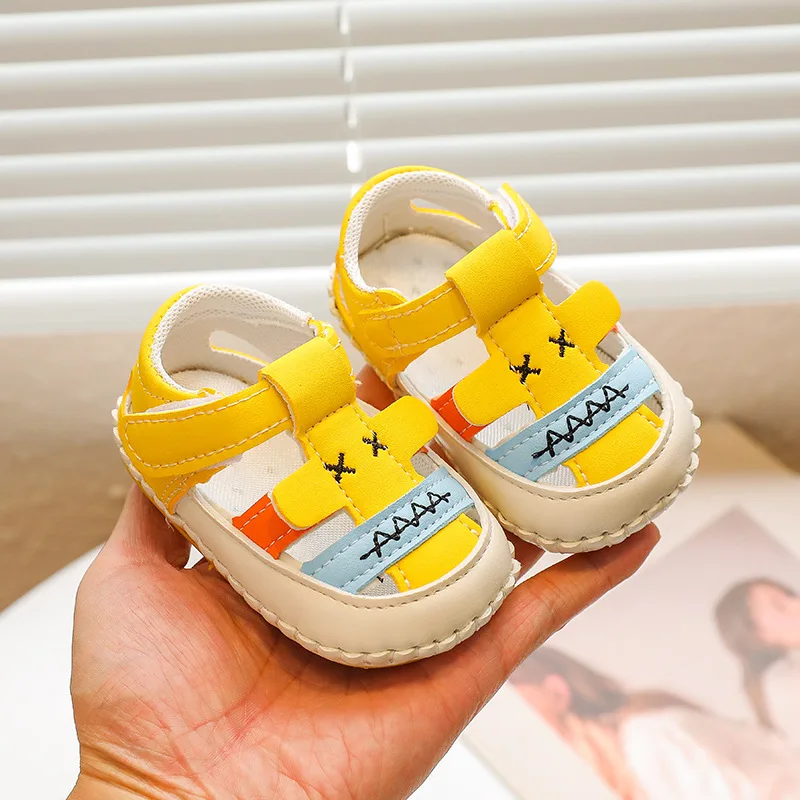 

Male baby sandals summer toddler shoes 0-1 years old soft soled female baby shoes Baotou 3-6-9 months a hair replacement