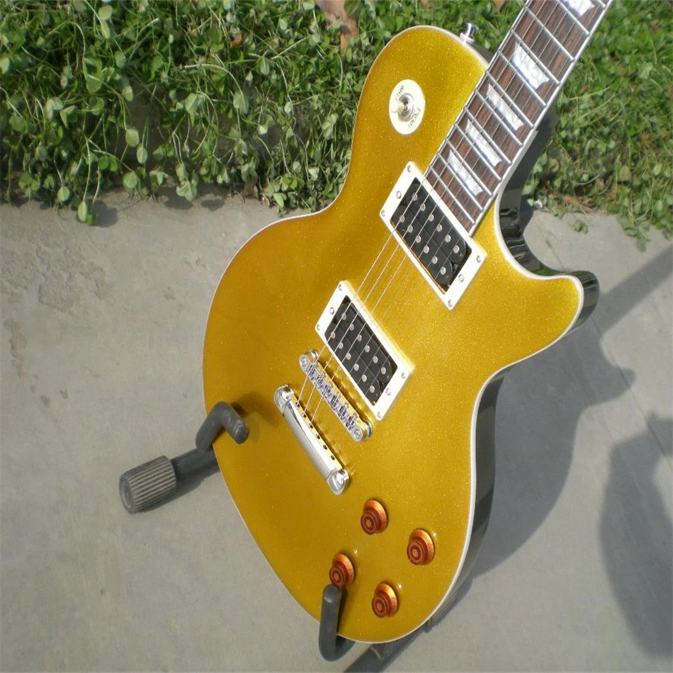 

Free shipping, high quality electric guitar, gold color, silver accessories