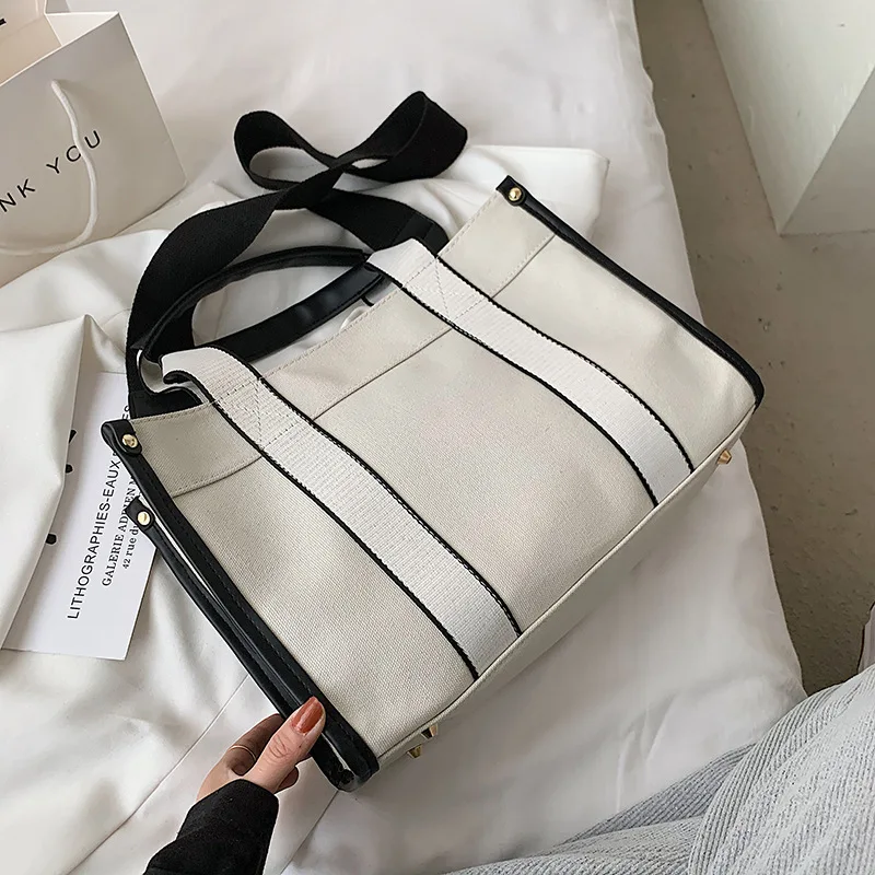 

2021 New Trendy Fashion Luxury High Quality Canvas Messenger Bag Simple Portable Tote Bag Large Capacity Bag Women's Bag Summer