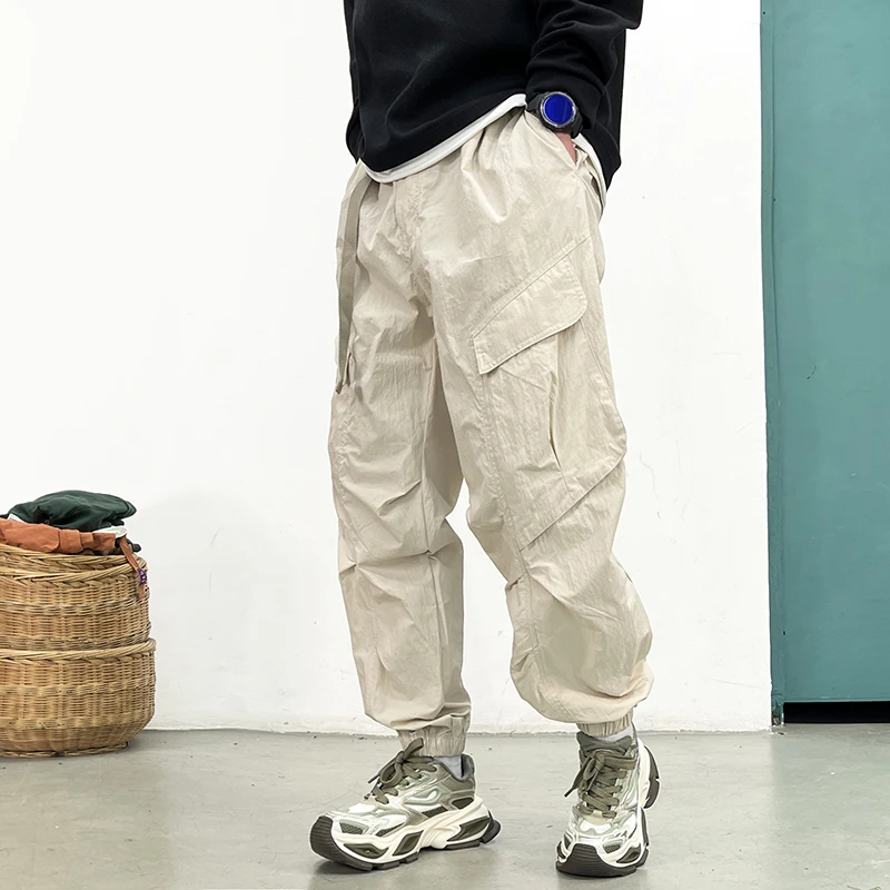 Фото Корейские брюки-карго Techwear, мужские весенне-летние быстросохнущие легкие уличные брюки, повседневные свободные зауженные брюки для бега, модные хип-хоп №3