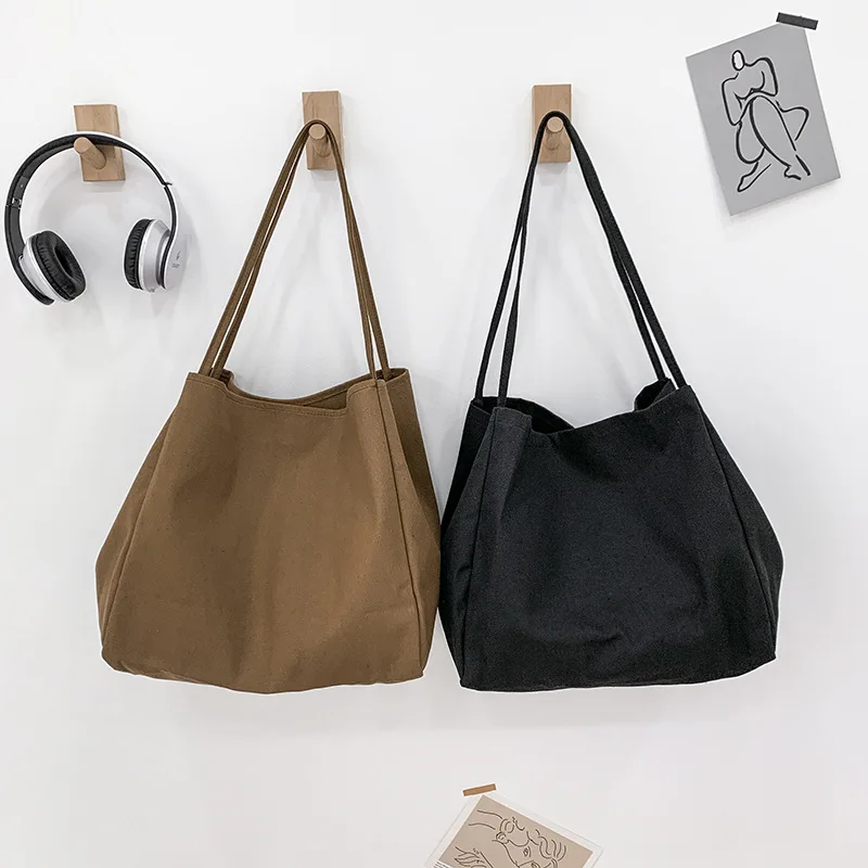 

Autumn new 2022 solid color women's single shoulder bag simple literary Canvas Handbag large capacity shopping bag