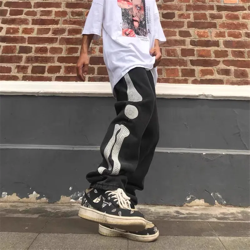 

Travis Scott high street washed jeans men and women big bone embroidery tide brand large size loose hip-hop trousers
