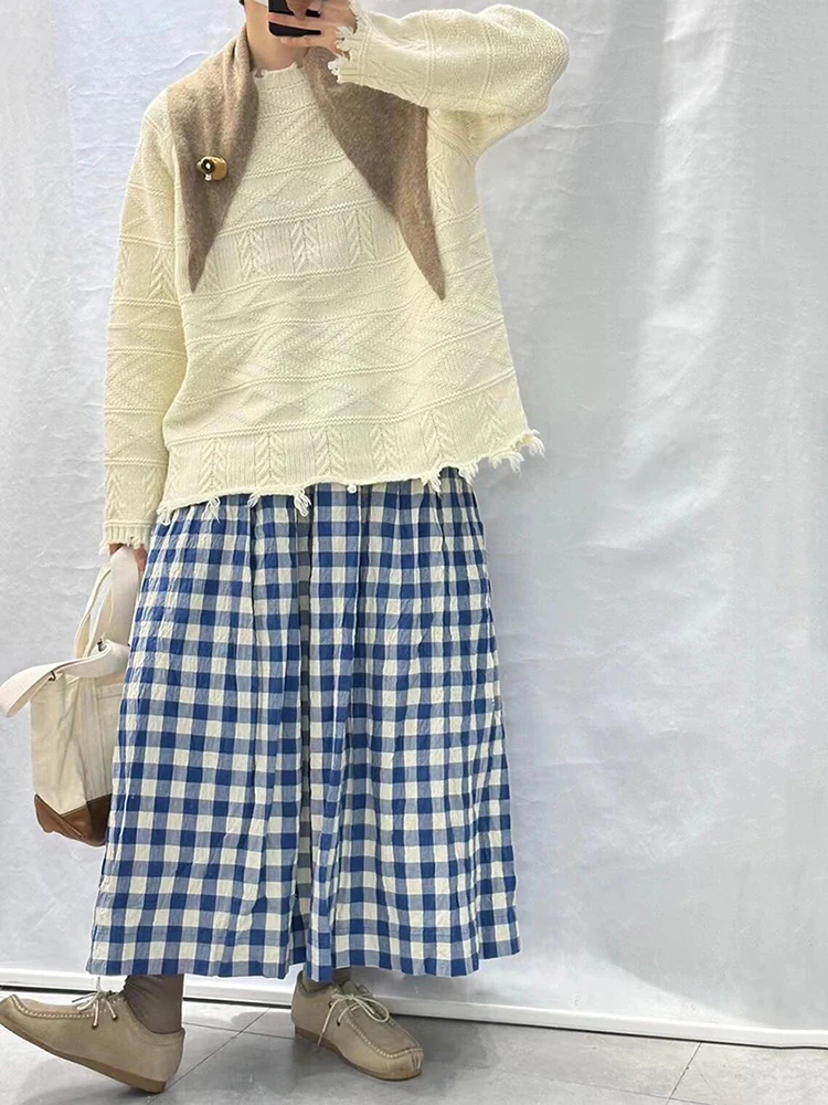 Женские клетчатые брюки в клетку с широкими штанинами