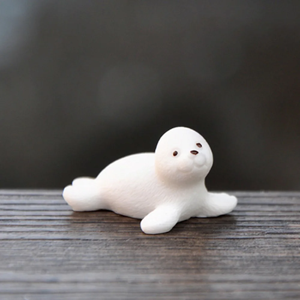 Миниатюрная фигурки пингвина на айсберге из смолы