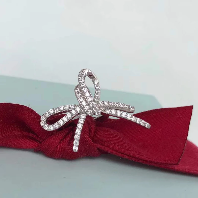 

Женские серьги-клипсы серебряного цвета с цирконом класса AAAAA