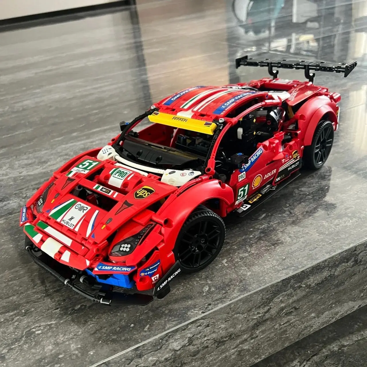 

Aimor 36.5cm Long Creative Super Car 1677 Pcs Vehicles Model 42125 Assembly Brick Children's Toys Gift Tabletop Decoratiion