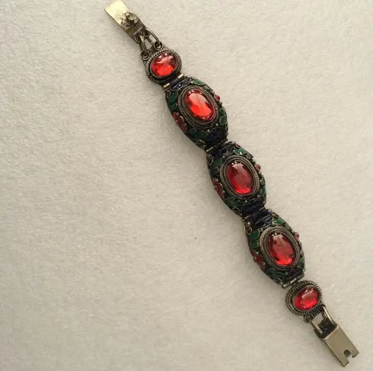 

Antique Chinese Ancient Tibetan Silver Inlaid Ruby Bracelet.