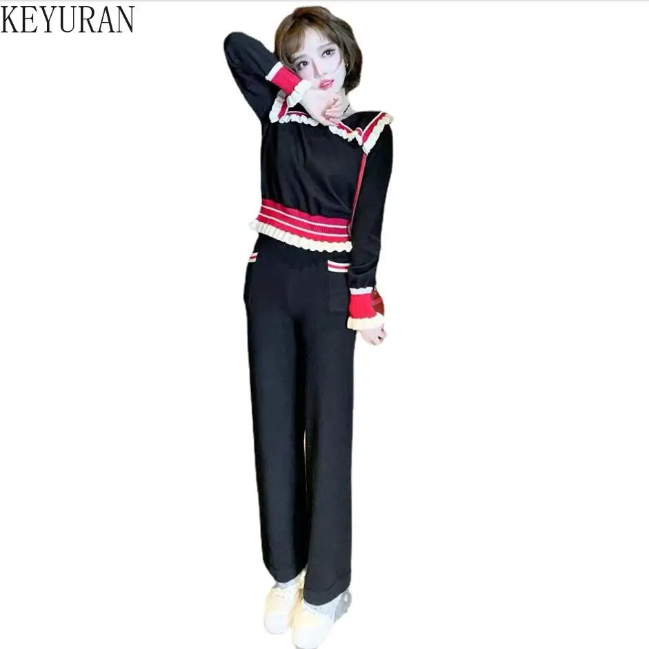 

Женский трикотажный костюм с оборками, свитер контрастных цветов с воротником «Питер Пэн» и длинными рукавами и брюки с широкими штанинами