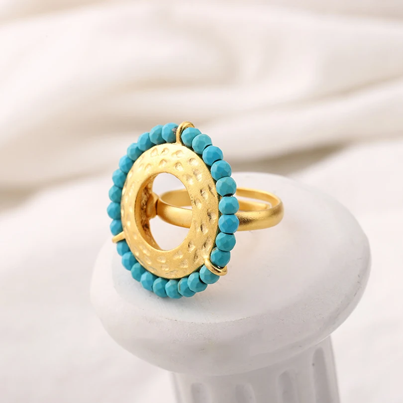 Комплект из колье серёг и кольца с золотистым сапфиром