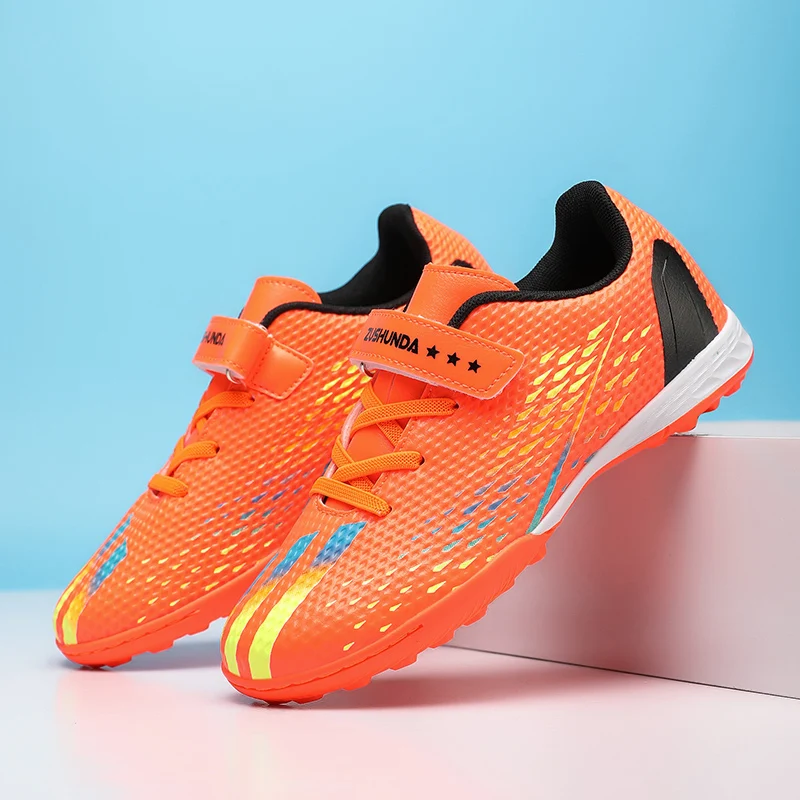 

Children Football Shoes Soccer Boots Kids Boy Girl Sneakers New Leather Breathable and Non Slip Teenagers Adults Shoes Size30-39