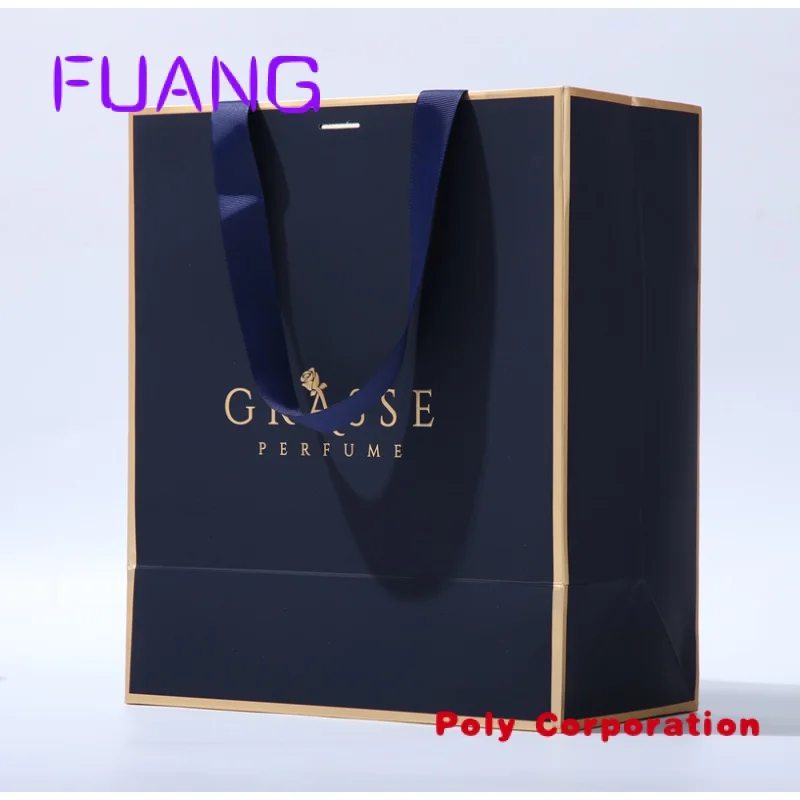 Wholesale paper bags custom logo clothes paper bag gold stamping luxury shopping clothes paper bags with logo ribbon handle