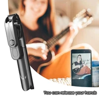 hot selling self timer lever xt09 live artifact bluetooth seven color selfie stick portable telescopic stand