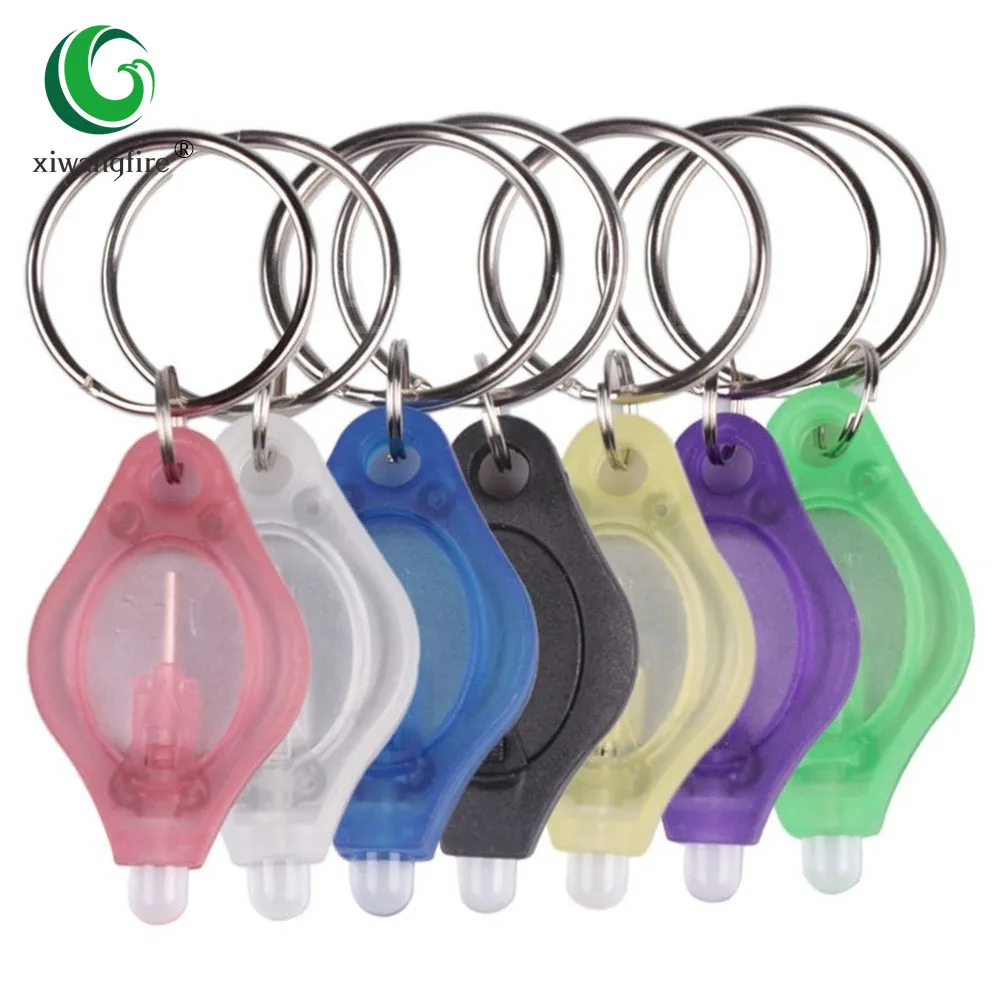 

10pcs / Mini Keychain Squeezer Light Lamp Micro LED Flashlight Keychain Torch Outdoor Camping Emergency Keychain Light Plastic