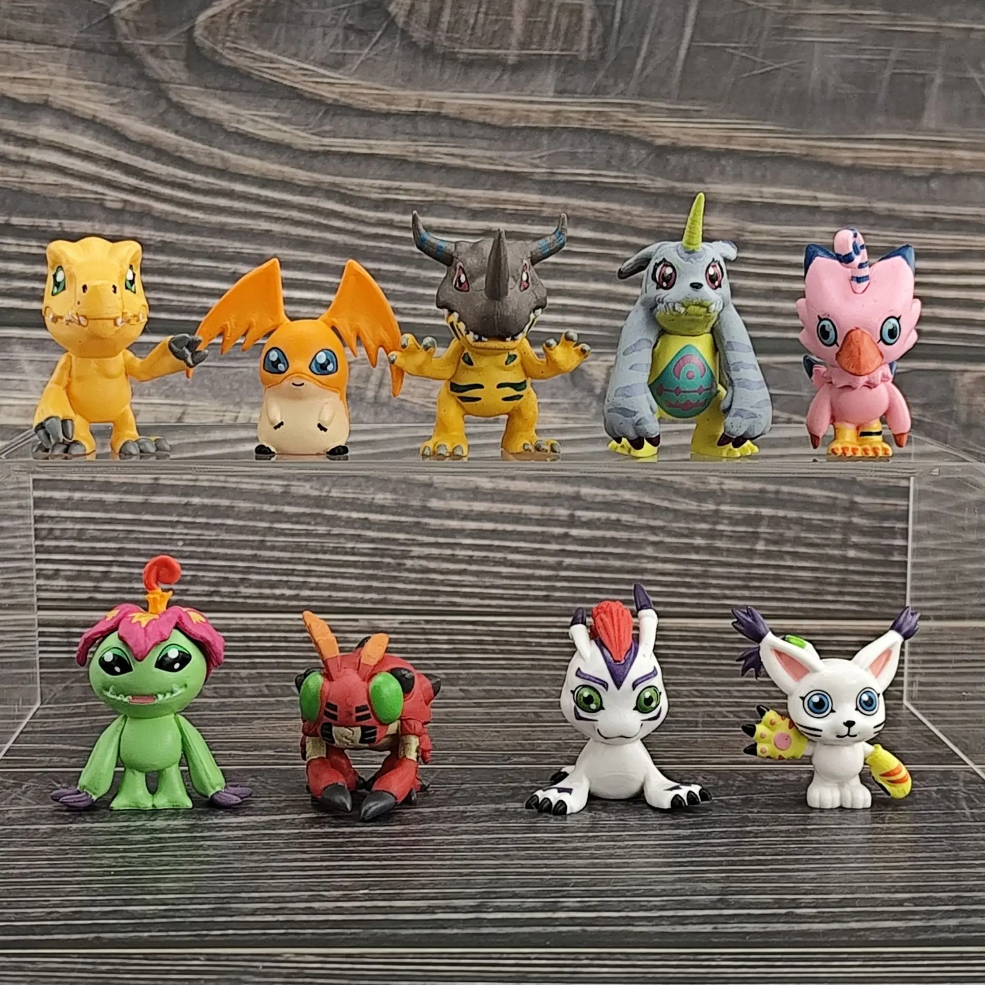 Фото Мини-фигурка Digimon Adventure 4 см: Агумон, Патамон, Греймон, Габумон, Баймон, Палмон, Тентомон, Гомамон, Гатомон. Модель из ПВХ для рабочего стола. №1