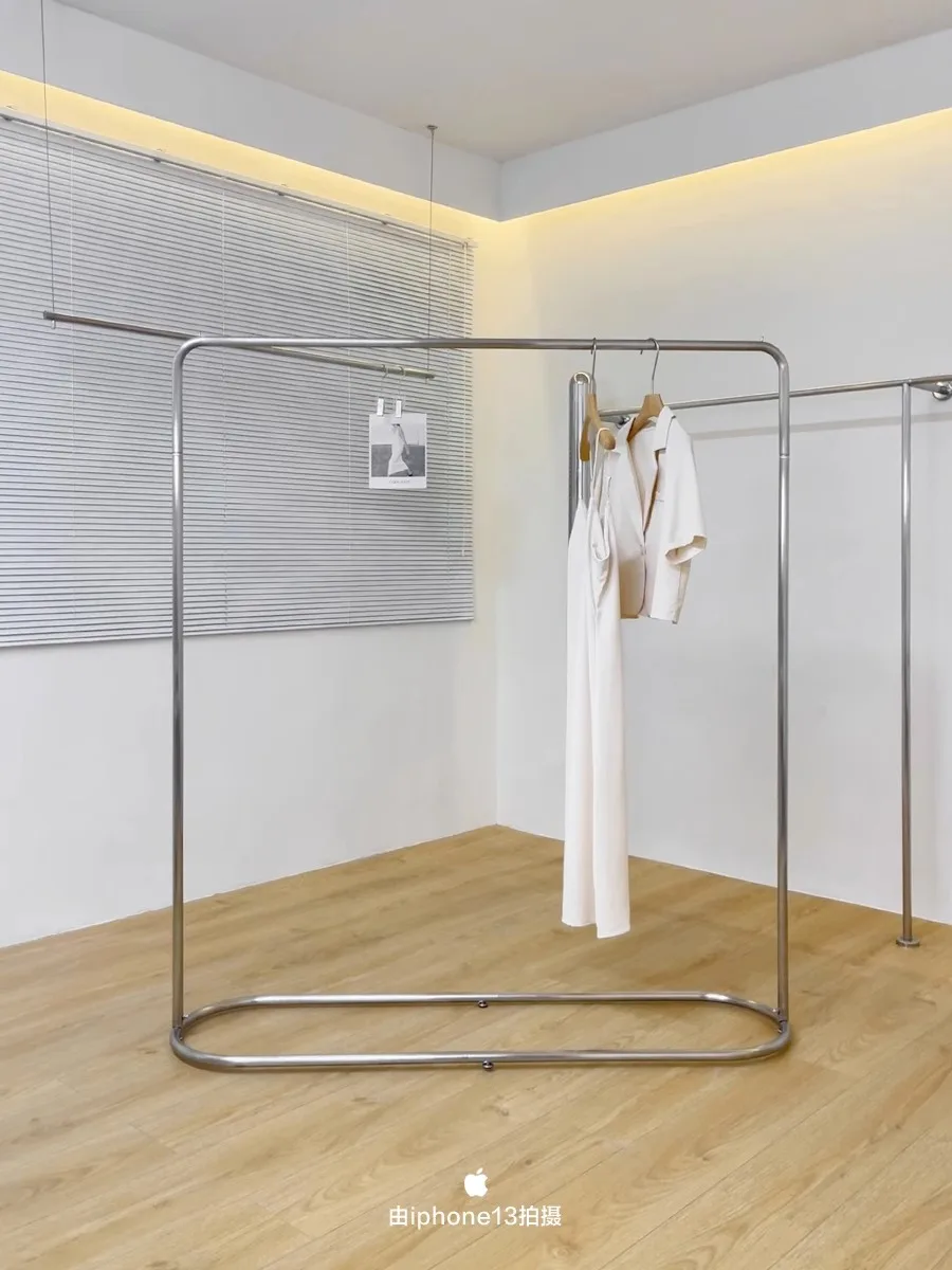 

Stainless steel silver children's clothing, women's clothing, island specific clothing store display shelves, hanging racks, dis