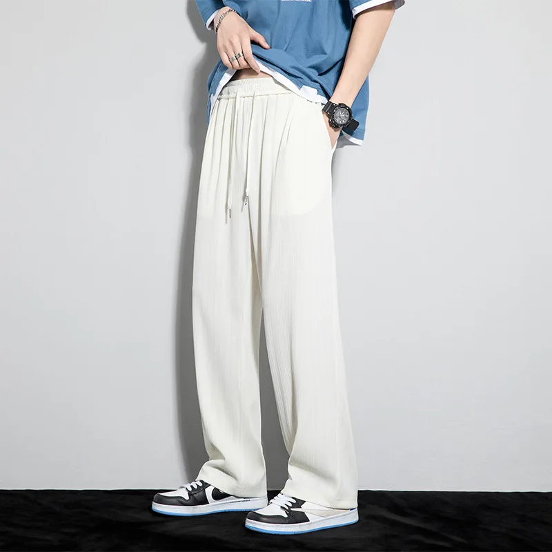 

2022 летние новые мужские штаны с высокой талией свободные однотонные шелковые брюки с эластичной резинкой на талии Брендовые брюки размера ...