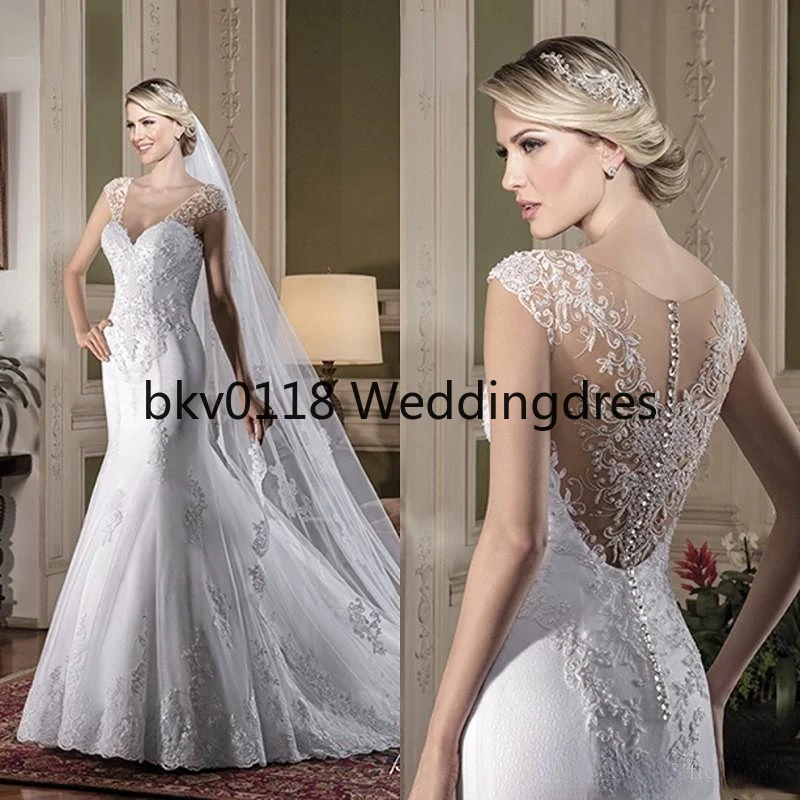 

Sweetheart Sleeveless Wedding Dresses Lace Appliques Pearl Illusion Mermaid Sheer Spaghetti Court Train Elegant Bridal Gown