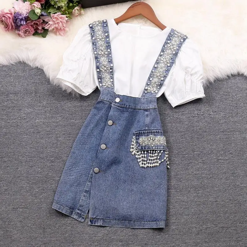 

Women 2022 Summer Fashion Suits Female Solid Color Round Neck Tops + Strap Denim Mini Skirts Ladies New Two Piece Sets J102