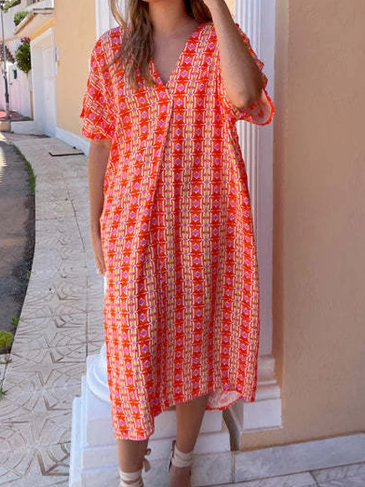 

Женское платье-пуловер с коротким рукавом и V-образным вырезом