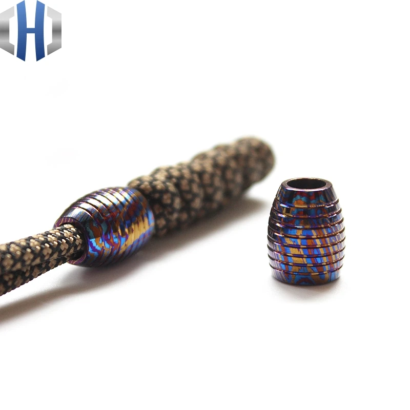 

Titanium Damascus EDC Knife Beads DIY Survival Paracord Beads.