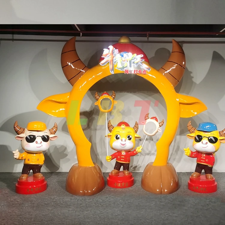 

Hot selling New Year custom zodiac ox fiberglass cartoon sculpture mascot New Year's day shopping mall decorations