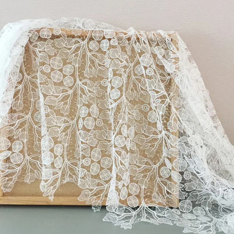 

Boutique off-white fish silk thread wedding lace fabric Hollow European and American dress lace accessories