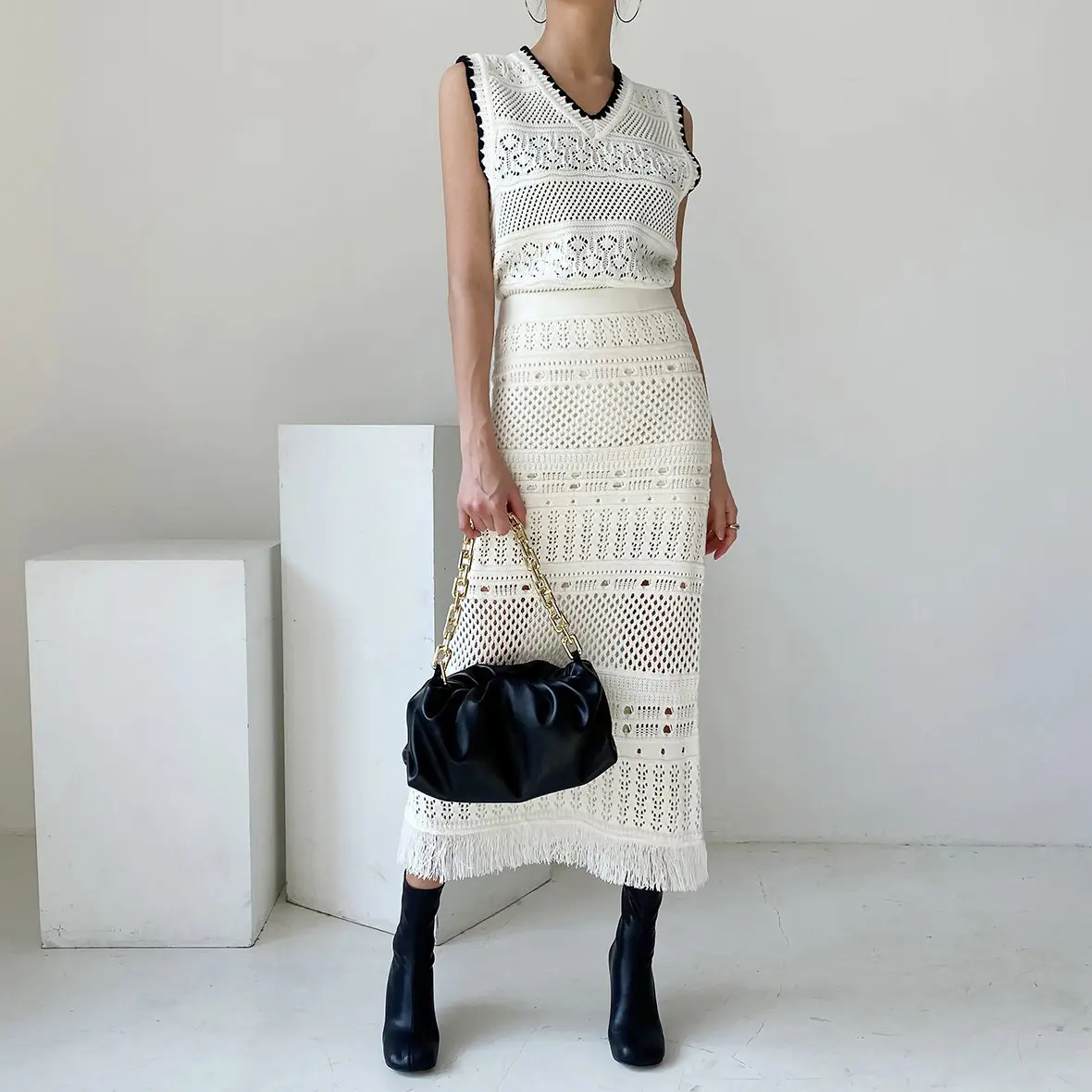 

Primaxis spring 2022 womens new fashion Korean ins two-piece tassel woven design hollow out suit 2022 summer Hip Wrap Skirt