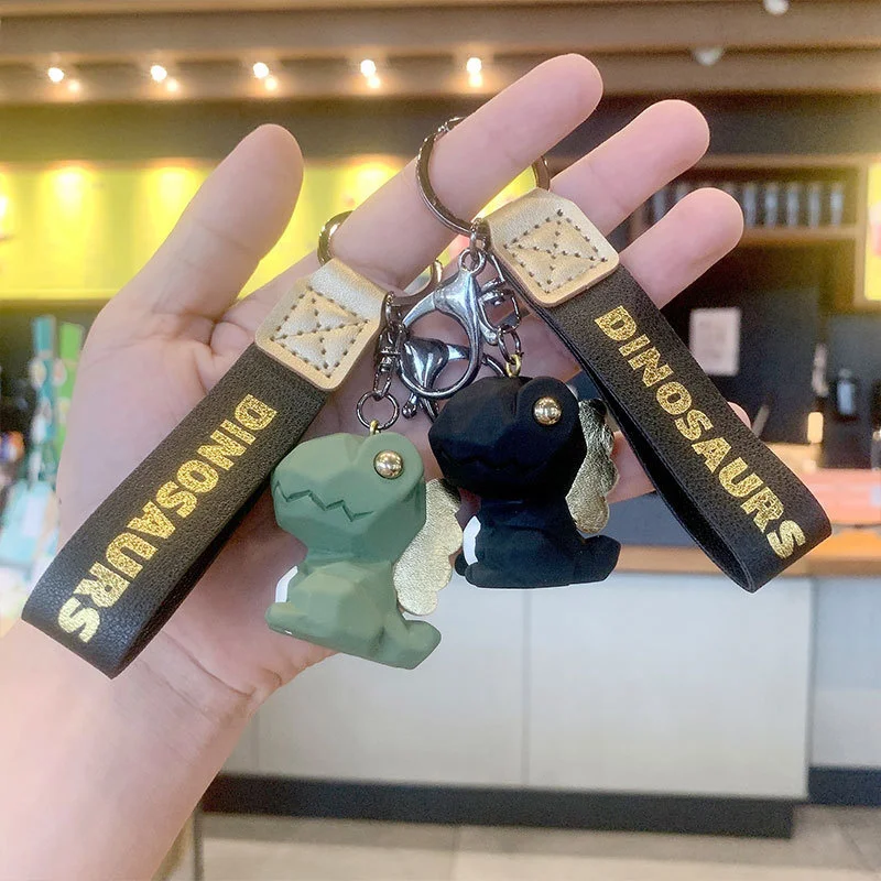 

Resin cartoon cut face dinosaur key chain schoolbag car key pendant creative doll bag pendant key chain