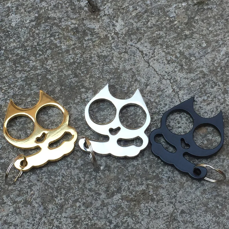 

Girl Defense Finger Buckle Portable Super Cute Cat Face Double Finger Buckle Cat Eye Tiger Key Buckle Window Breaker Prop