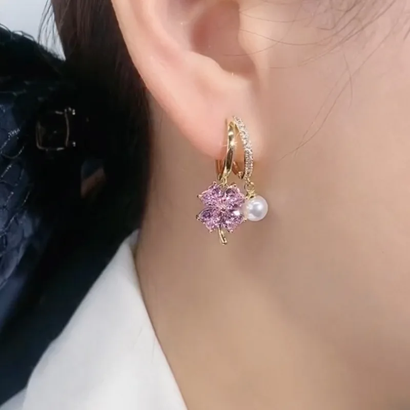 

Серьги с фиолетовым кристаллом и четырьмя листьями