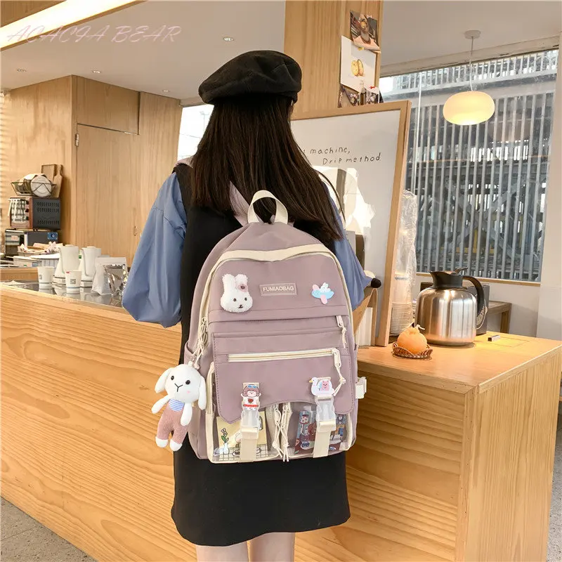 

2022 Women Cute Badge Backpack High Capacity Female Harajuku College Lady Kawaii Cartoons Backpack Fashion Book Girl Bag Student