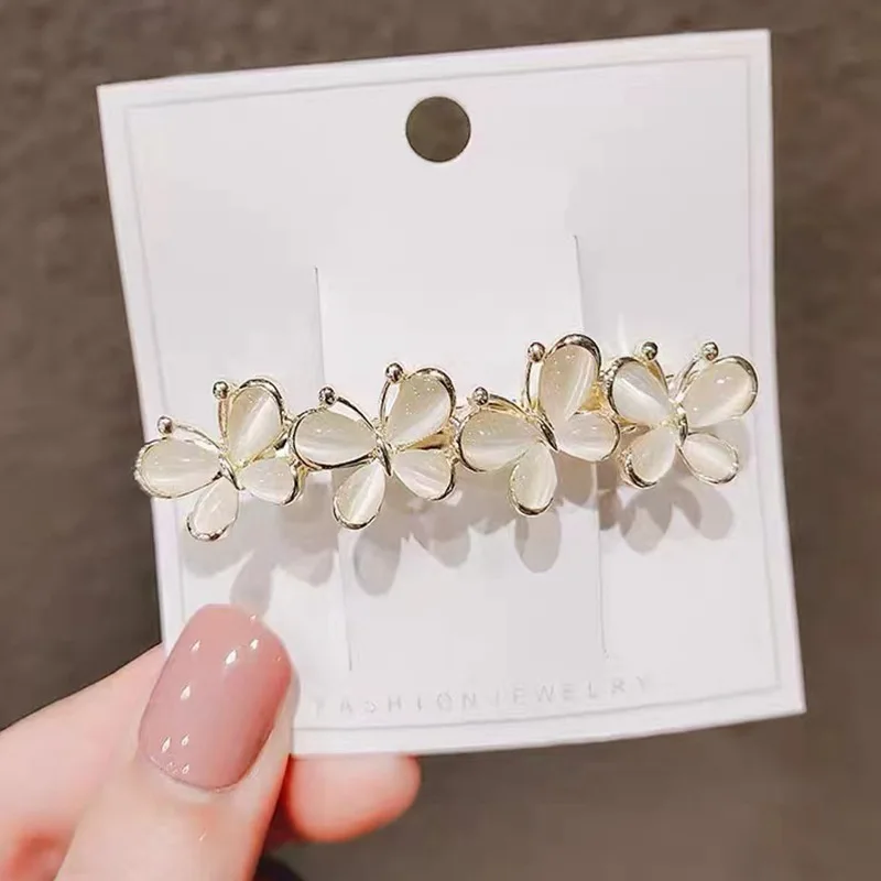 

Fashion Butterfly Cat's Eye Spring Clip Elegant Temperament Hairpin Side Bangs Internet Celebrity Top Clip